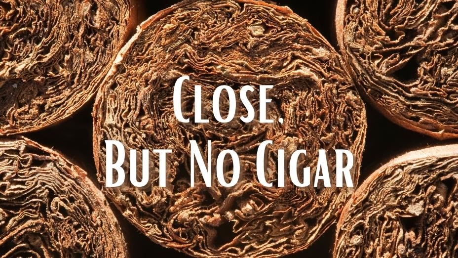 Origin of the Phrase “Close, but No Cigar”